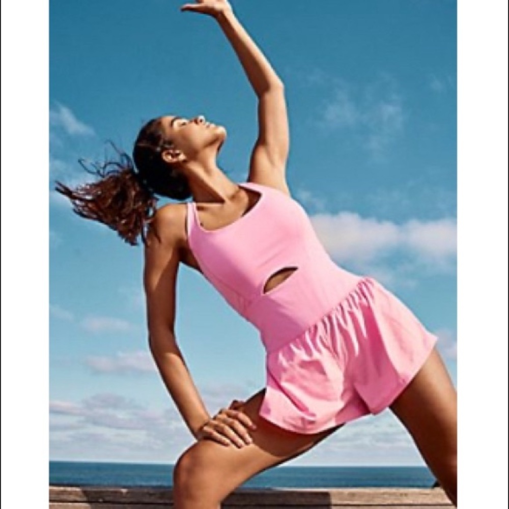 Free people movement riteous onesie, bright pink